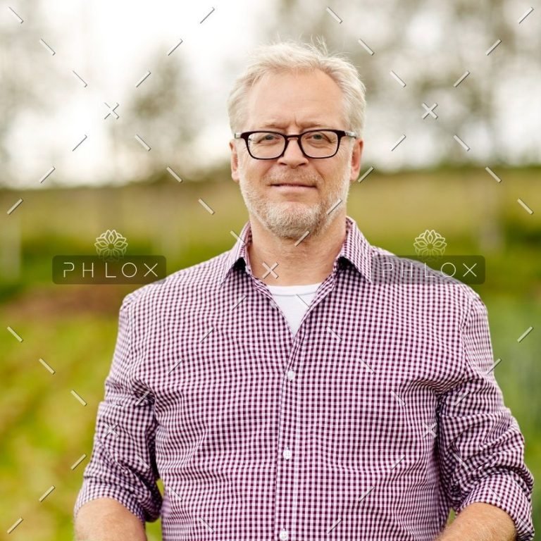 demo-attachment-444-senior-man-with-box-of-vegetables-on-farm-PHMQ8WB@2x-1